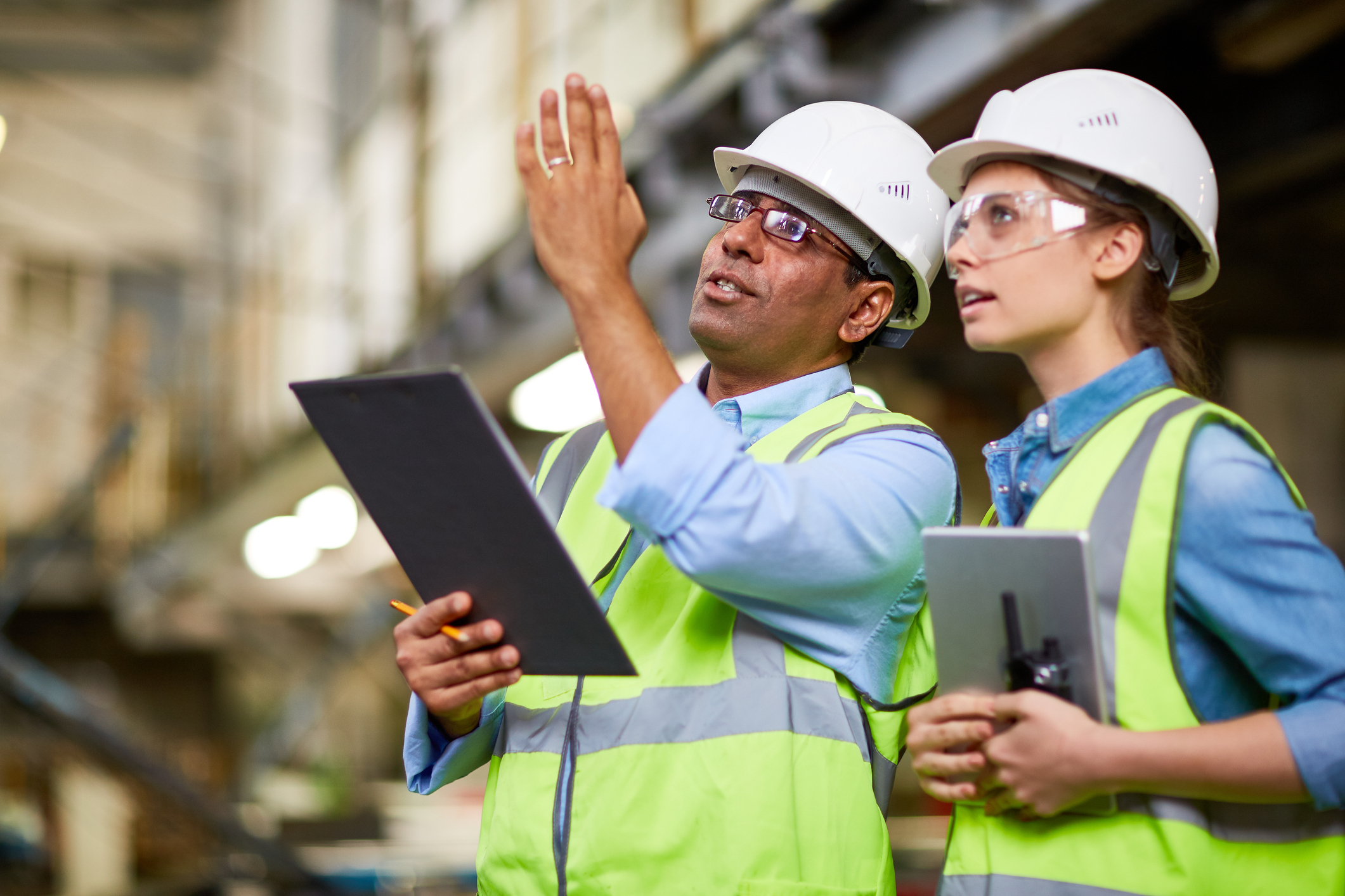 Image: iStock - Male engineer showing the project to his colleague.