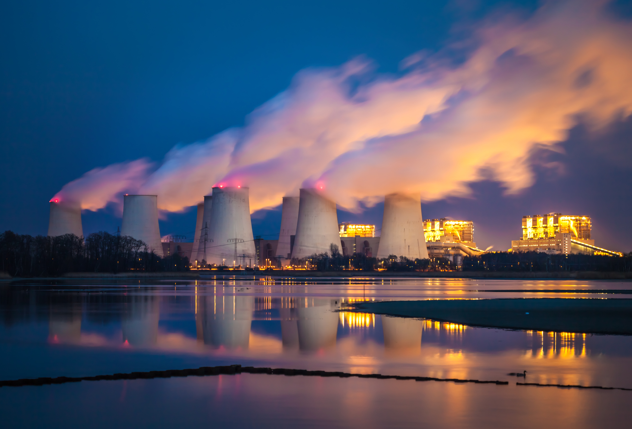 Image: ©iStock - Power plant at night